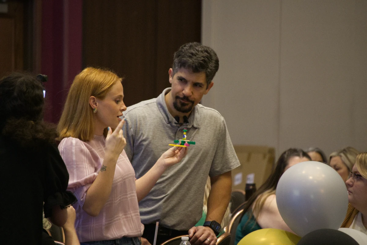 andrew-berrigan-listening-to-participant Andrew Berrigan listening intently as a participant explains her LEGO model