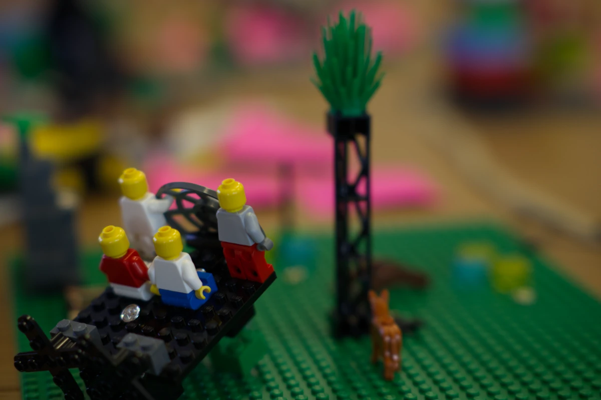 LEGO minifigures facing forward together in a model of a shared adventure
